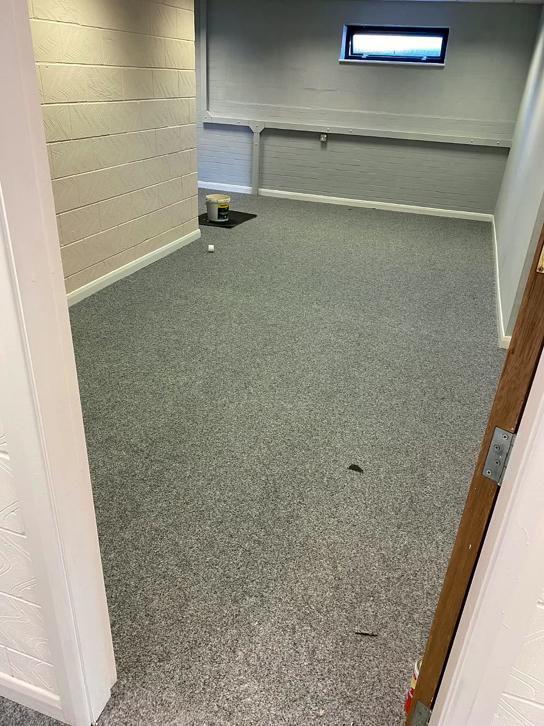 Grey carpet fitted in an office